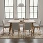 Dining room with a wooden table and gray chairs in front of large windows.
