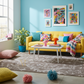 Colorful living room with a yellow sofa, abstract art, and decorative items.