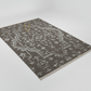 Patterned rug on a light gray background