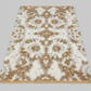 Patterned rug with brown and beige design on a gray background