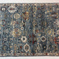 Decorative rug with intricate patterns on a white background