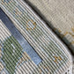 Rug with a ruler for scale showing its width