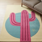 Pink cactus-shaped rug on a beige floor with a blue circle in a living room setting.