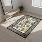 Decorative rug with floral patterns on a wooden floor in a bright room.