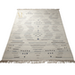 Beige rug with geometric pattern and tassels on a white background