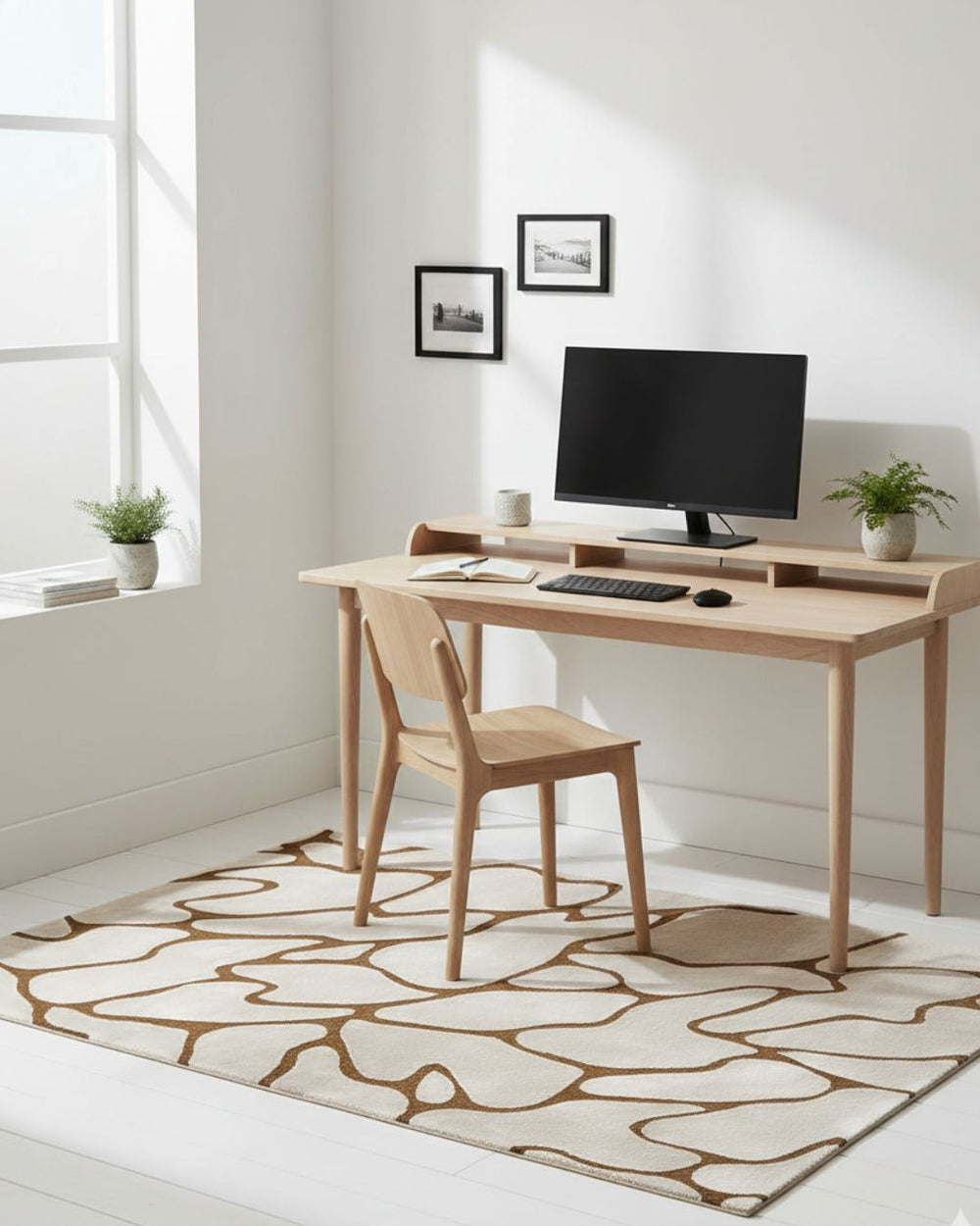 Modern home office with a wooden desk, chair, and computer setup.