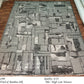 Gray geometric patterned rug on a wooden floor