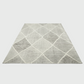 Geometric patterned rug on a plain background