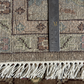 Rug with a measuring ruler showing dimensions on a textured surface