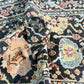Close-up of a patterned rug with intricate designs