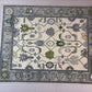 Decorative rug with geometric pattern on a white floor