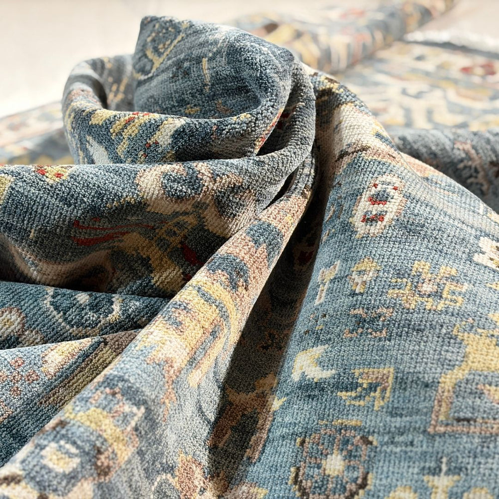 Close-up of patterned fabric with blue and beige colors