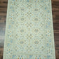 Decorative rug with intricate patterns on a wooden floor