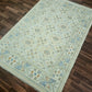 Decorative rug with intricate patterns on a wooden floor