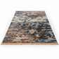 Patterned rug with fringe on a white background