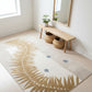 Rug with leaf design in a room with a wooden bench and plants.