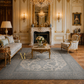 Luxurious living room with ornate furniture, fireplace, and decorative elements.