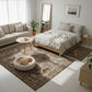 Modern bedroom with a bed, sofa, and decorative elements.