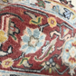 Close-up of a colorful patterned rug with intricate designs.