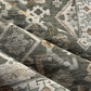 Close-up of a textured rug with geometric pattern