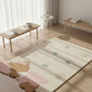 Children's rug with cartoon designs on a wooden floor in a room with light curtains.