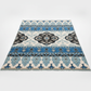 Decorative rug with blue and black patterns on a white background