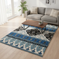 Living room with a blue and white patterned rug, gray sofa, and wooden coffee table.
