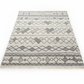 Patterned rug with geometric design on a white background