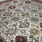Close-up of a patterned rug with intricate designs.