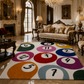 Luxurious living room with ornate furniture and a colorful number-patterned rug.