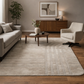 Beige patterned rug on a wooden floor in waiting area