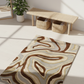 Patterned rug on a light wooden floor with a bench and baskets in the background.