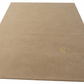 Beige fabric surface with a gold logo on a white background