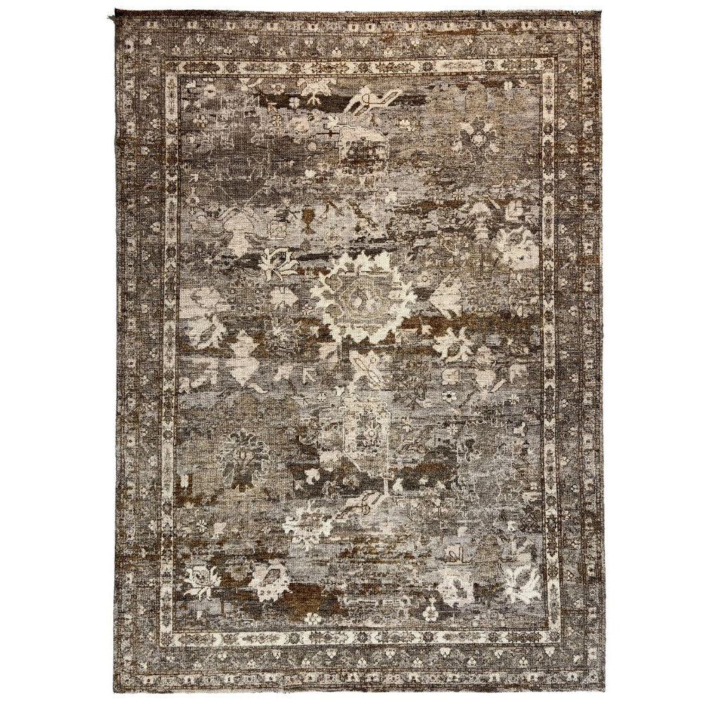 Decorative rug with intricate patterns on a white background