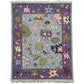 Decorative rug with colorful abstract patterns on a white background