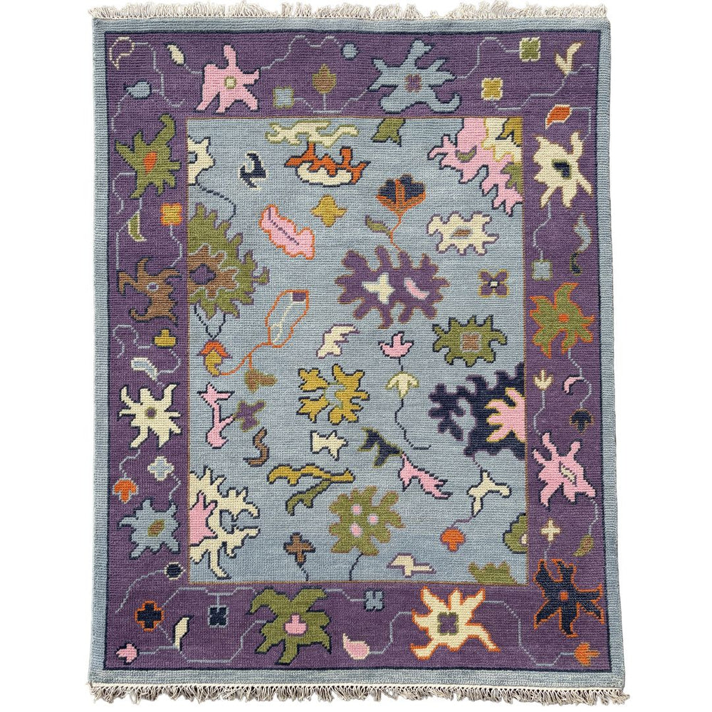 Decorative rug with colorful abstract patterns on a white background