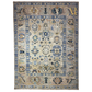 Decorative rug with intricate patterns on a beige background