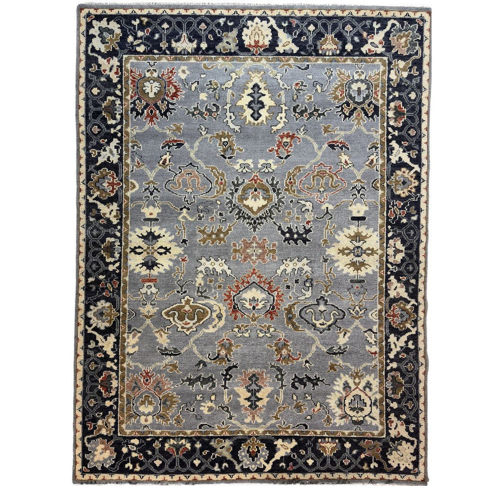Decorative area rug with intricate patterns on a white background