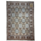 Decorative rug with intricate patterns on a white background