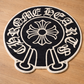 Chrome Hearts Rug on a wooden floor
