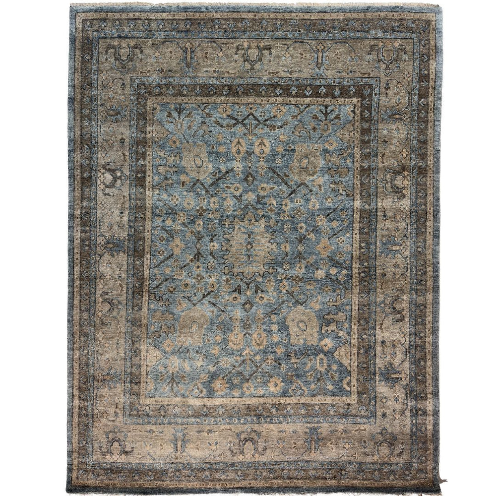 Decorative rug with intricate pattern on a plain background