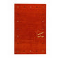 A rectangular red woven rug with a subtle vertical texture, featuring a gold 'AR' logo in the center, accented with small black and white geometric details around the border, shown on a plain white background.