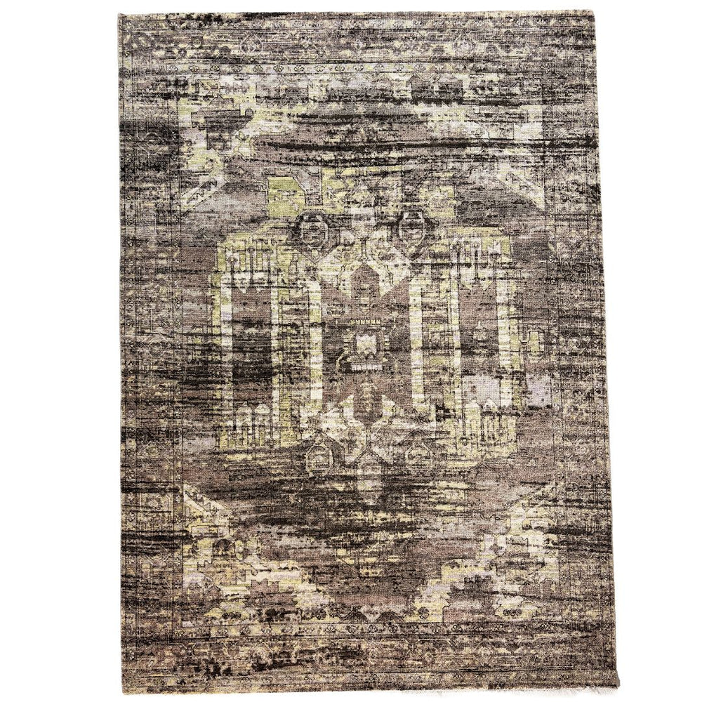 Patterned rug with abstract design on a plain background