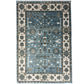 Decorative rug with a blue and beige pattern on a white background