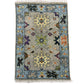 Decorative rug with intricate patterns on a white background