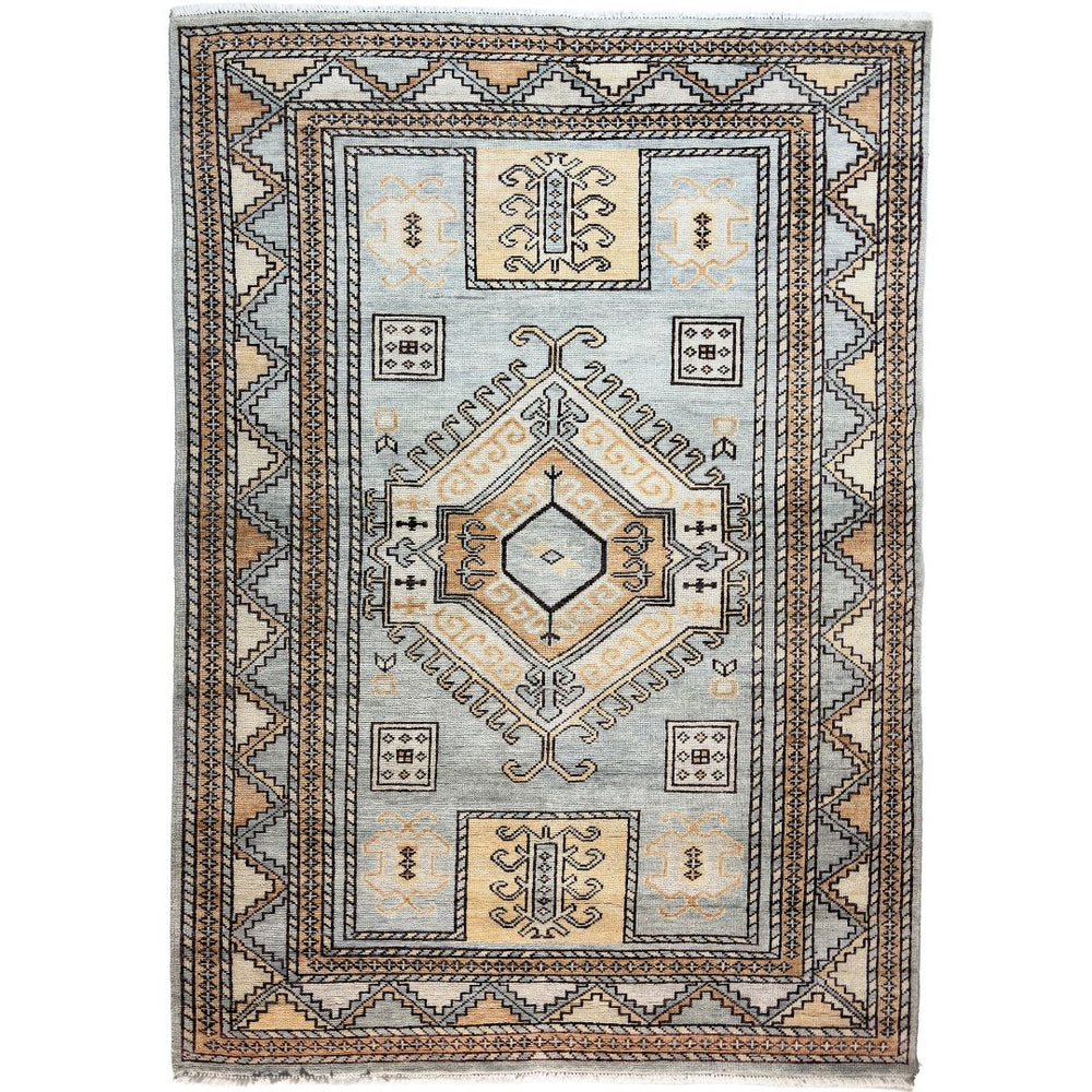 Decorative rug with geometric pattern on a white background