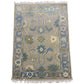 Decorative rug with intricate patterns on a white background