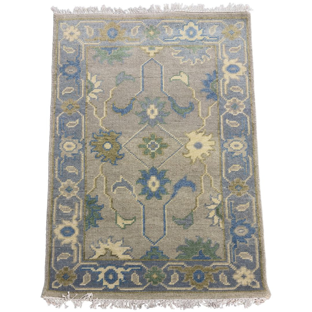 Decorative rug with intricate patterns on a white background