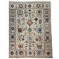 Decorative rug with intricate patterns on a plain background