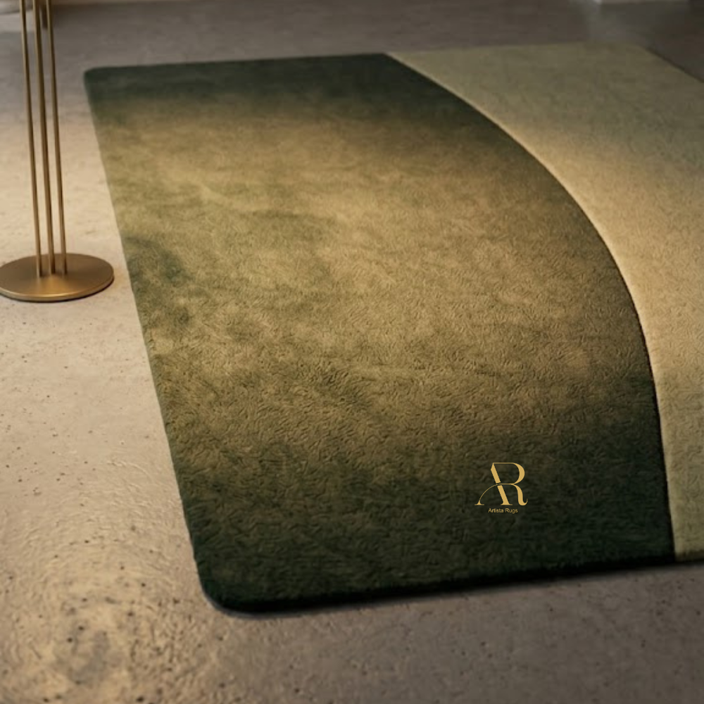 Gradient green and brown rug with a brand logo on a neutral floor.